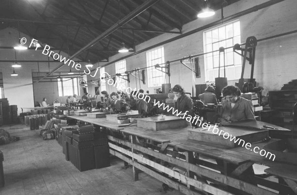 TRAVEL GOODS LTD IN FACTORY CUTTING FIBRE FOR SUITCASE FOLDING